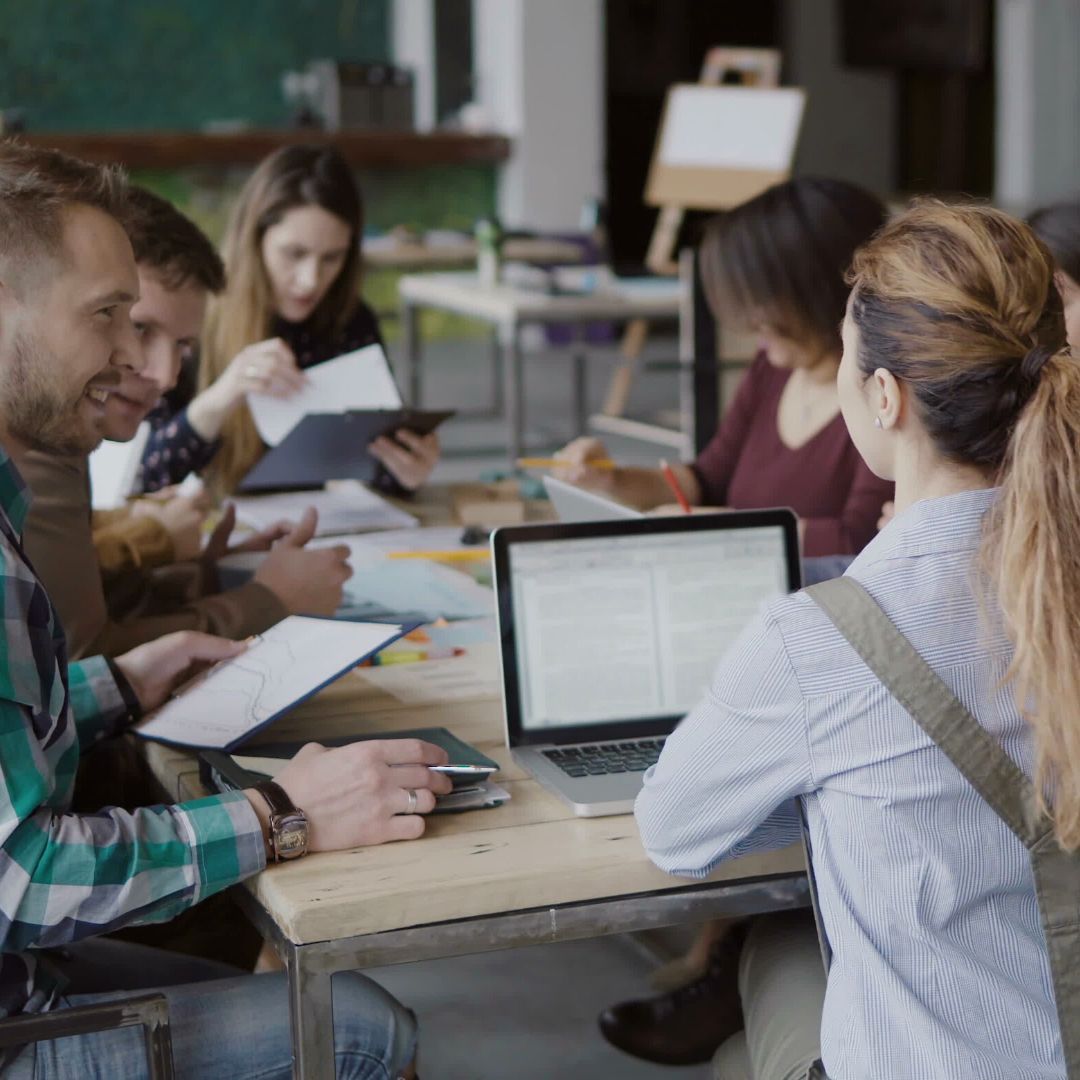 Team meeting in enclosed room