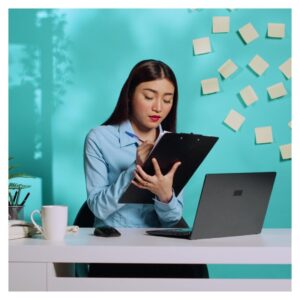 a woman taking notes